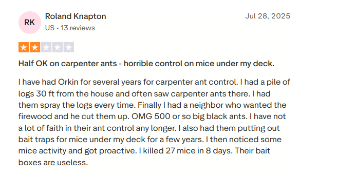 Three-star customer review of Orkin pest control service on a review page.