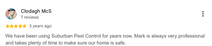 Google review from a long-term Suburban Pest Control customer praising their technician's professionalism.