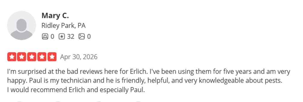 Yelp review from a long-term Ehrlich Pest Control customer praising their reliable service.